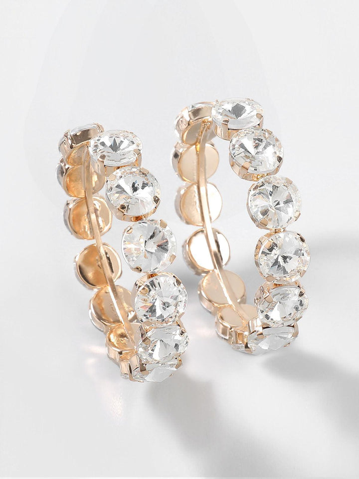 https://cdn.shopify.com/s/files/1/0930/2979/4119/files/TerraDiamanteHoopEarrings_3_7a3bf44c-c7aa-475f-ac7e-5535b0952556.jpg?v=1772630528
